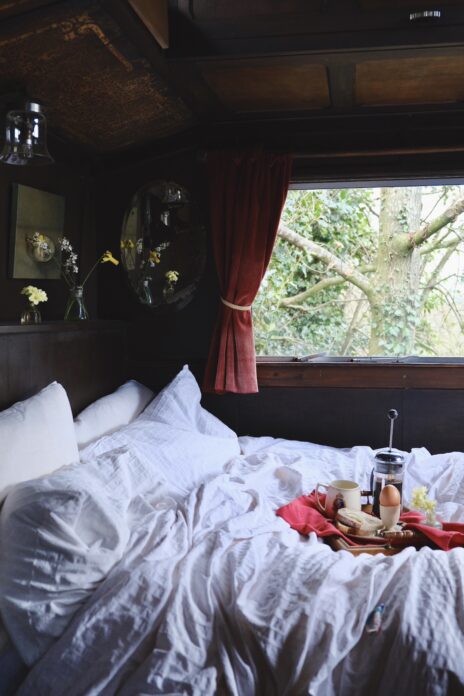 Bedroom of wagon with breakfast tray